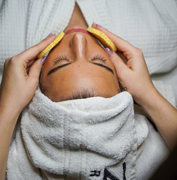 Image of a lady getting a face spa 