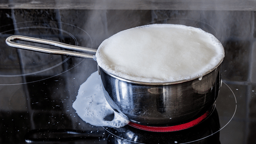 boiling over of milk on a stove