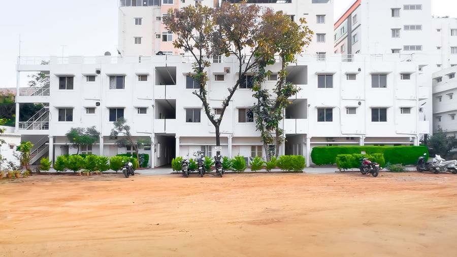 Wide outdoor area with apartment building in the background at The Pinnacle, Electronic City.