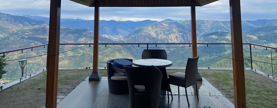 outdoor sitting area with table and chairs - Aranya Himalayan Retreat, Mashobra