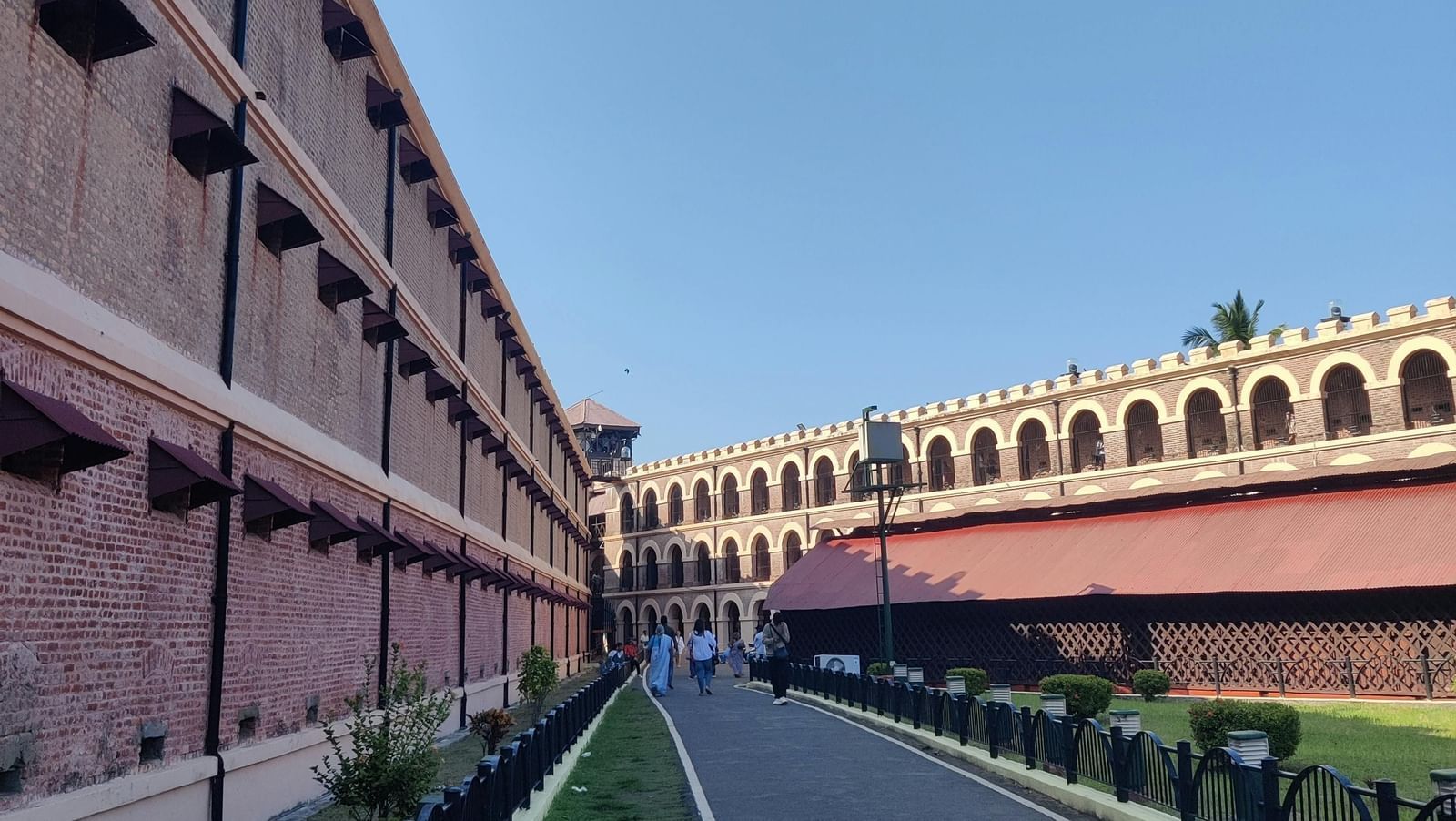 A wide-angle shot of the Cellular Jail, Port Blair, with a clear blue sky in the background.