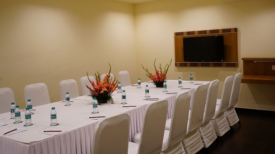 Board Room featuring audio & visual facility and elegant seating arrangements at Shervani Nehru Place, New Delhi