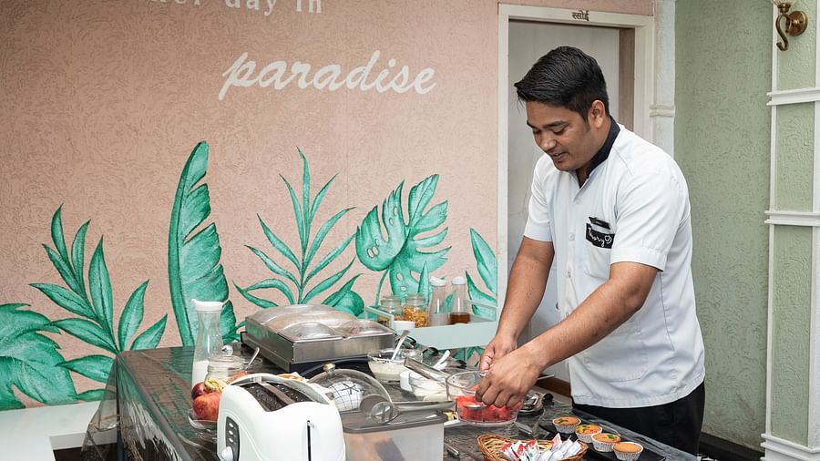 chef setting up buffet breakfast