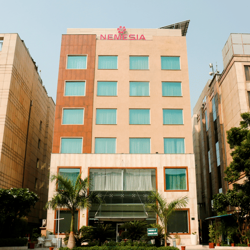 Facade of Nemesia Hotel in Guegaon 1