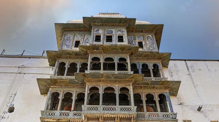facade view of Sajjangarh fort with many windows on it - Chunda Shikar Oudi Udaipur.