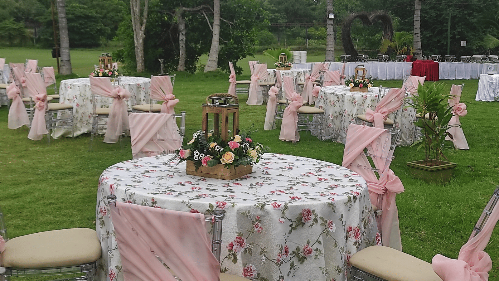 An event space at Avana Resorts, featuring decorated chairs and tables set for an event.