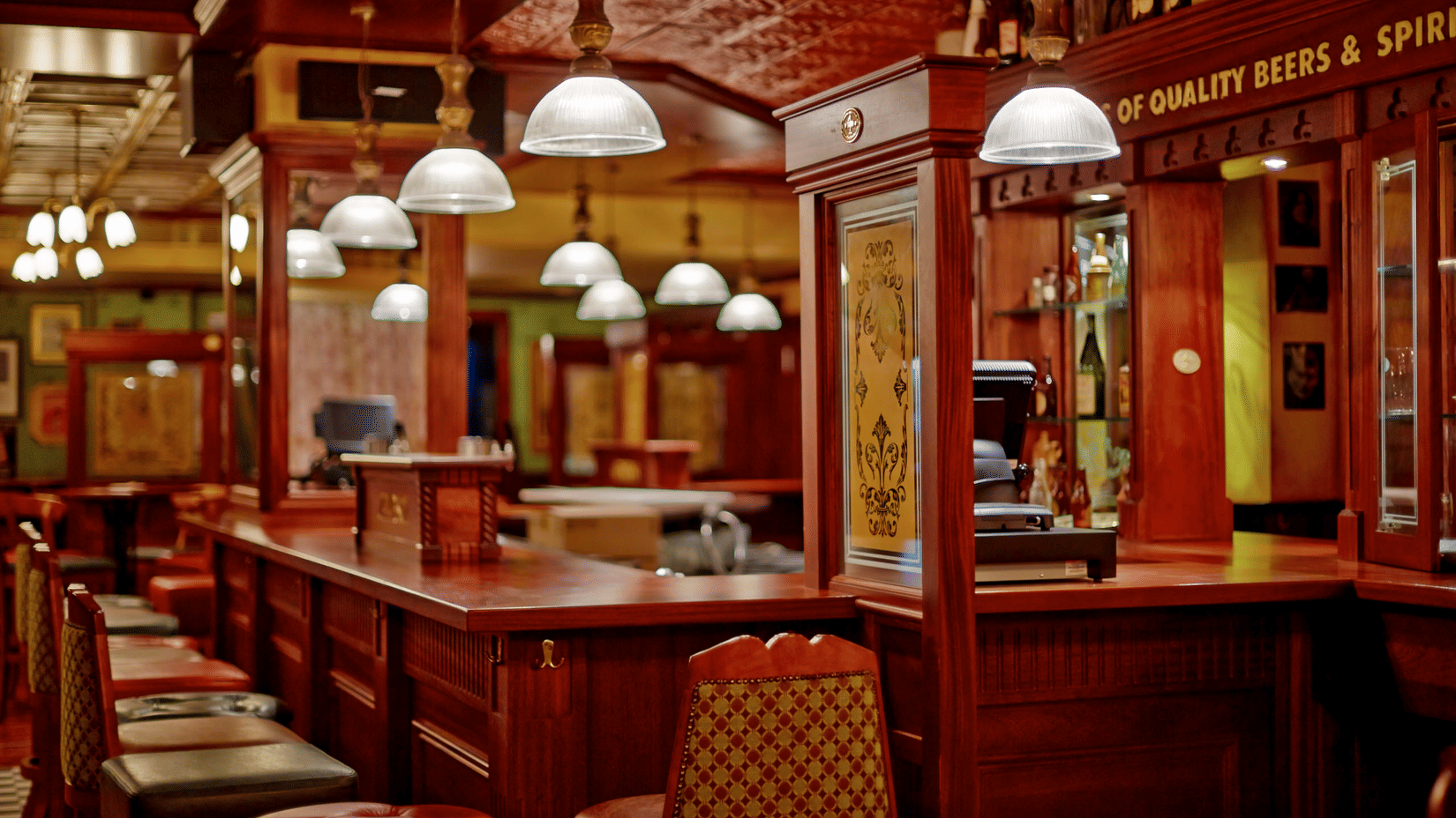 Classic Irish-themed pub interiors with wooden finishes, bar seating, and vintage-style lighting for relaxed evenings | Hablis Hotel Chennai