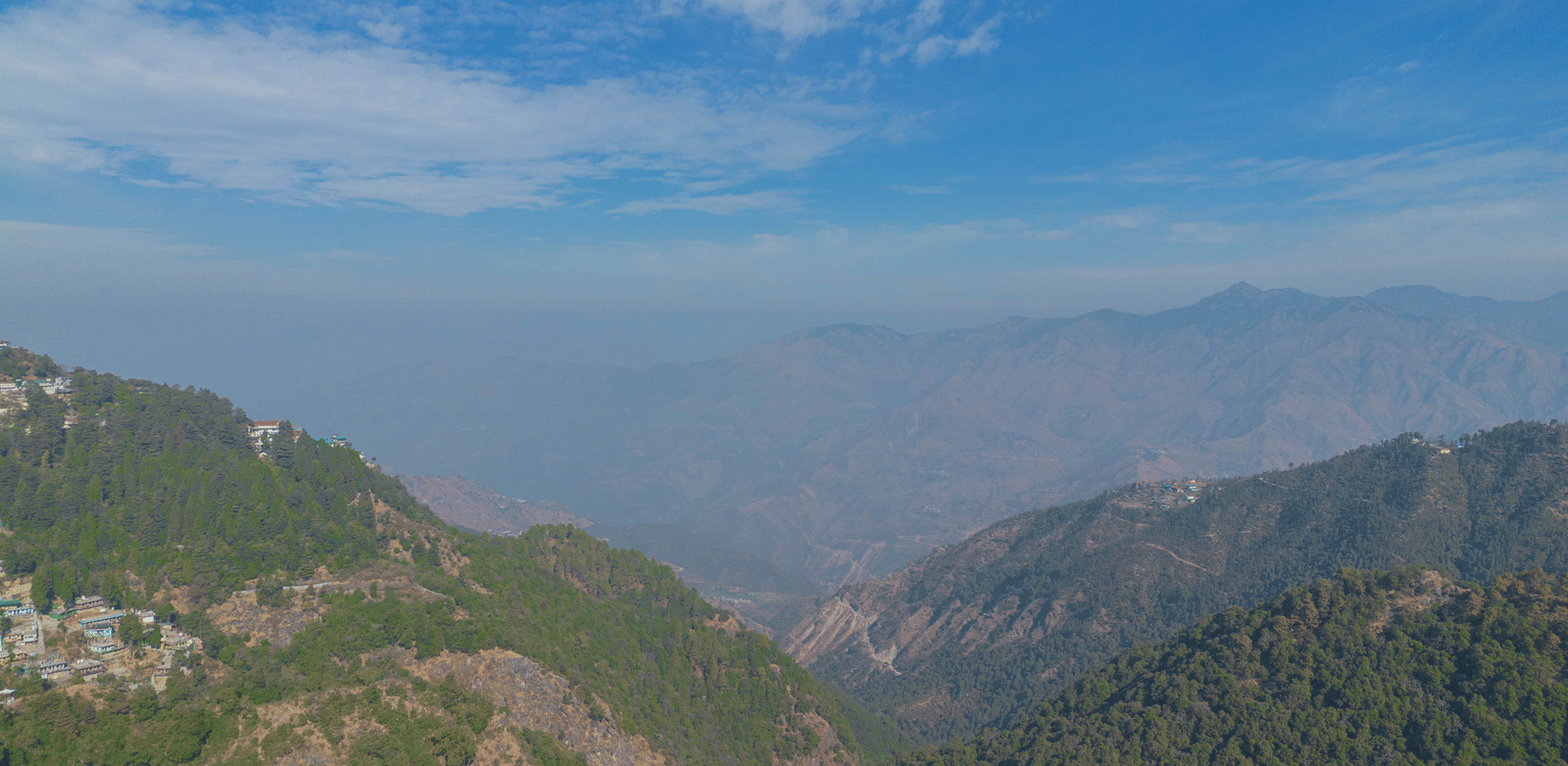 Mountain and valley landscape view from the hotel at Perfectstayz Premium at Mall Road Hotel Super, Mussoorie.