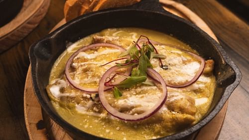 A gravy in a pan bowl