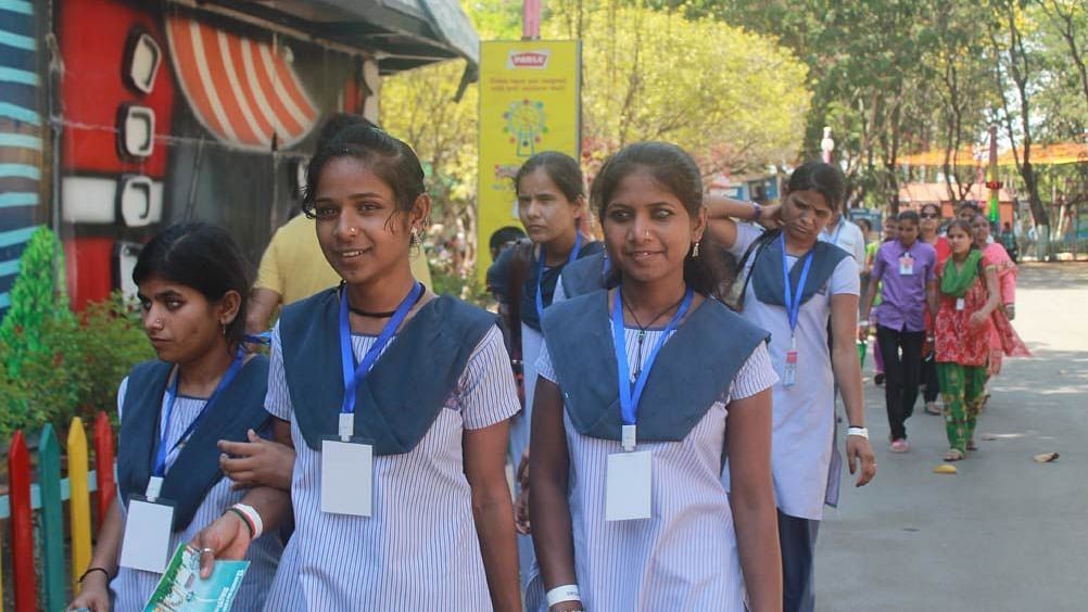Water Kingdom - a group of school children walking