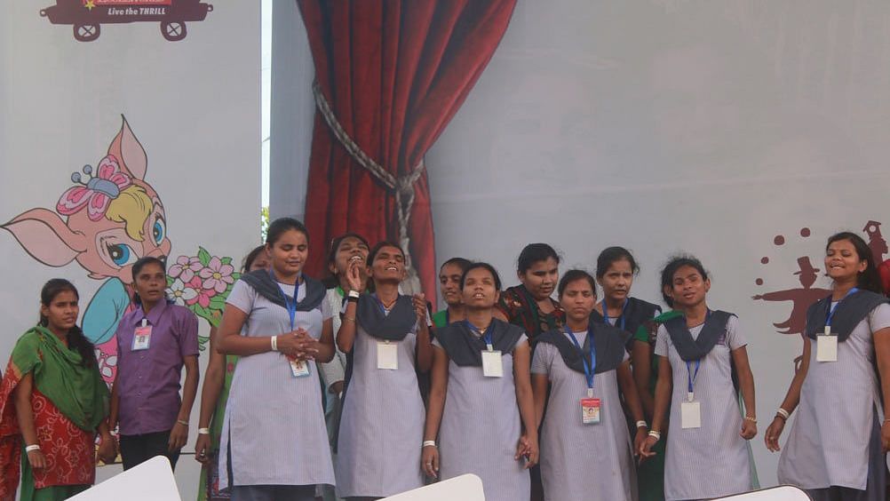 a group of school children in uniform