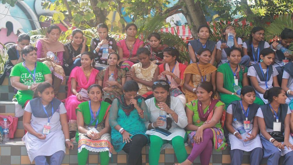 Water Kingdom - a group of school children in uniform posing for the camera