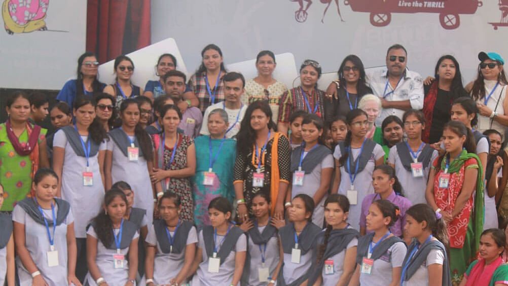 Water Kingdom - a group of school children in uniform posing for the camera