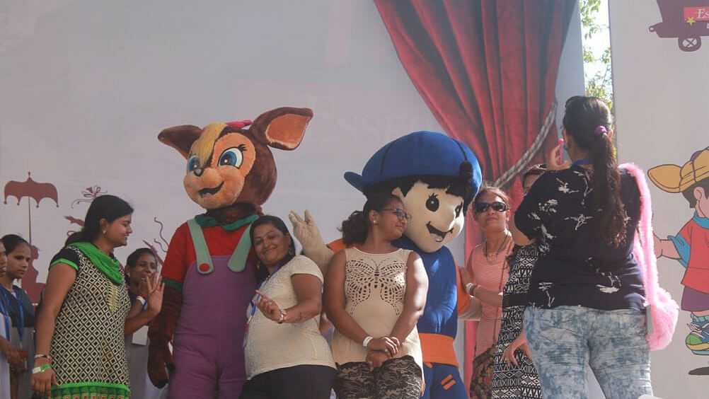 Water Kingdom - a group of people and mascots