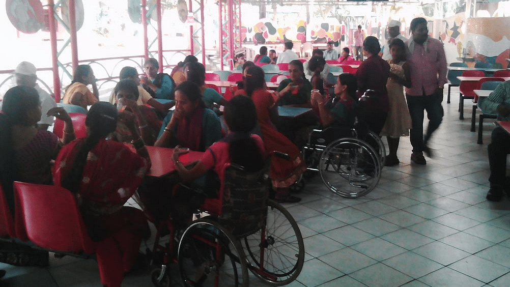 a group of people at a cafeteria