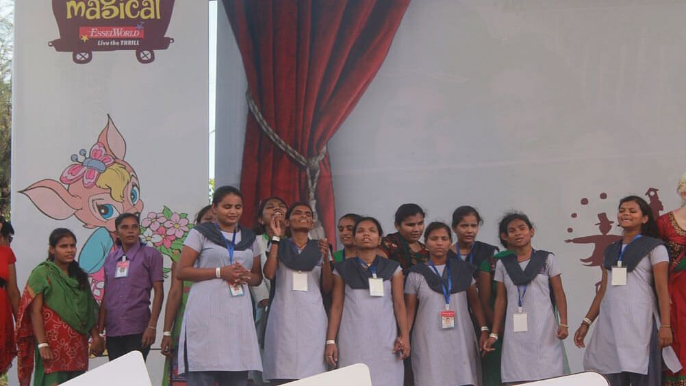 Water Kingdom - a group of school children in uniform posing for the camera