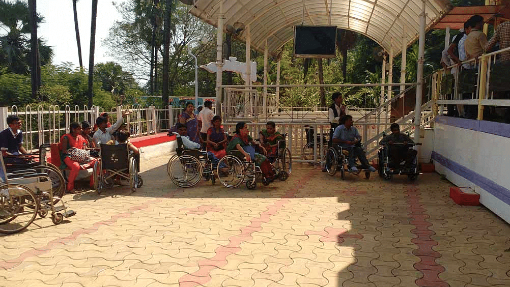 a group of people in wheel chairs during daytime
