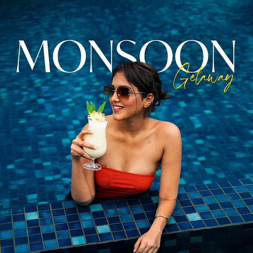 A poster for Monsoon Getaway at The Dukes Retreat featuring a woman in a red swimsuit holding a drink in a pool