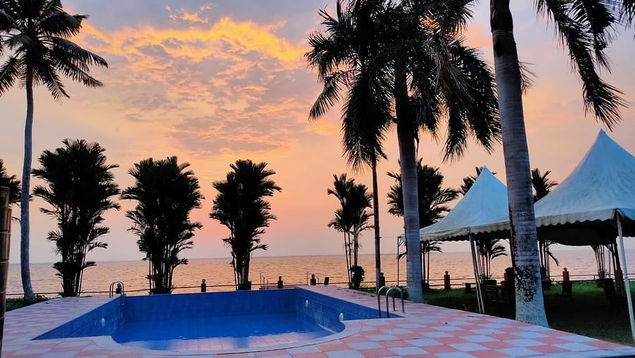 an image if a pool during sunset 