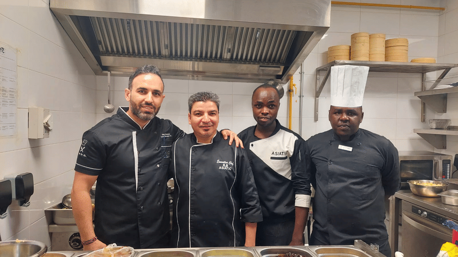 The chefs of Asiatic Rooftop Bar and Restaurant in Kenya standing