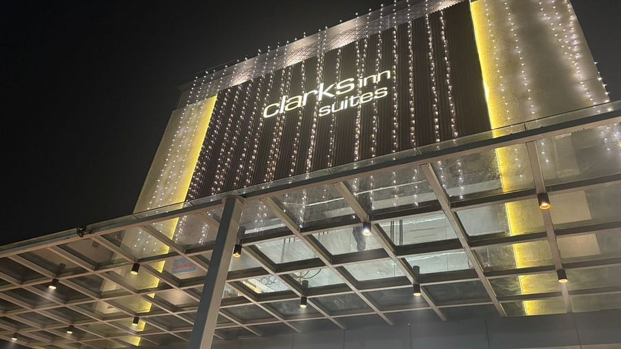 Close-up Facade view of Clarks Inn Suites, Agra against night sky.
