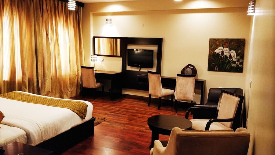 Executive Suite with chair, television - Five Elements The Claire, Gurugram
