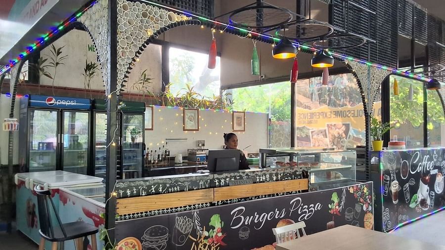 an image of close up view of front portion of munching cafe with eateries and beverages.