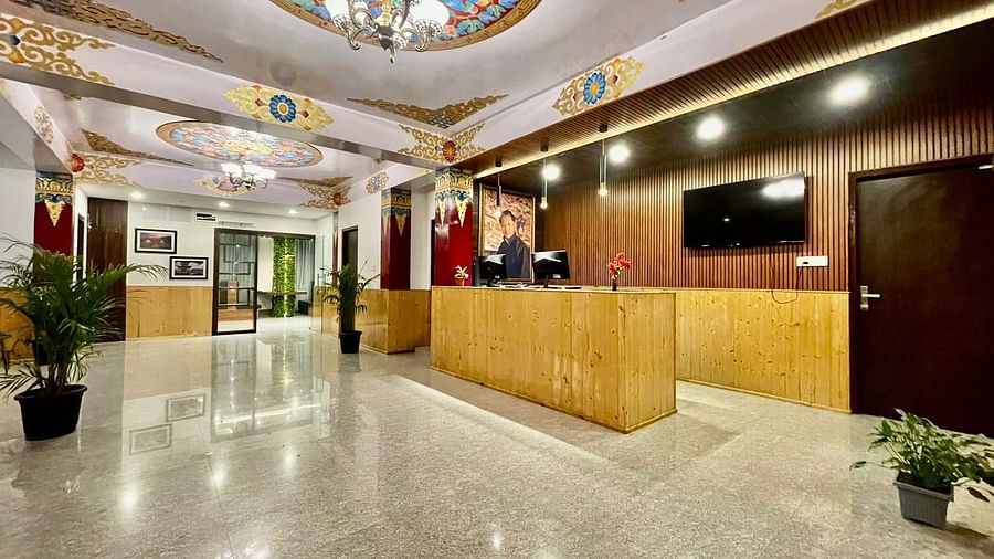 A wide view of a well-lit reception area at our hotel near MG Marg | Voyage The Royal Retreat, Gangtok