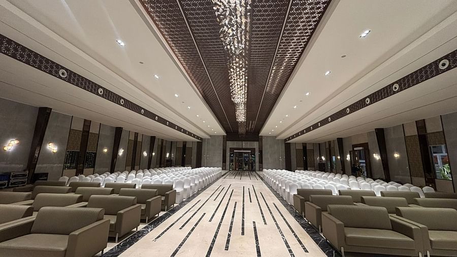 Elegant Indoor Banquet Hall with Stylish Striped Flooring and Ceiling Lights - VRR Astoria Hotel and Conventional Centre