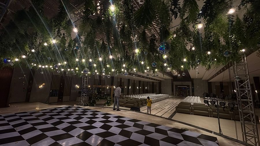 Enchanting Outdoor Event Space with Hanging Lights and Checkered Floor - VRR Astoria Hotel and Conventional Centre