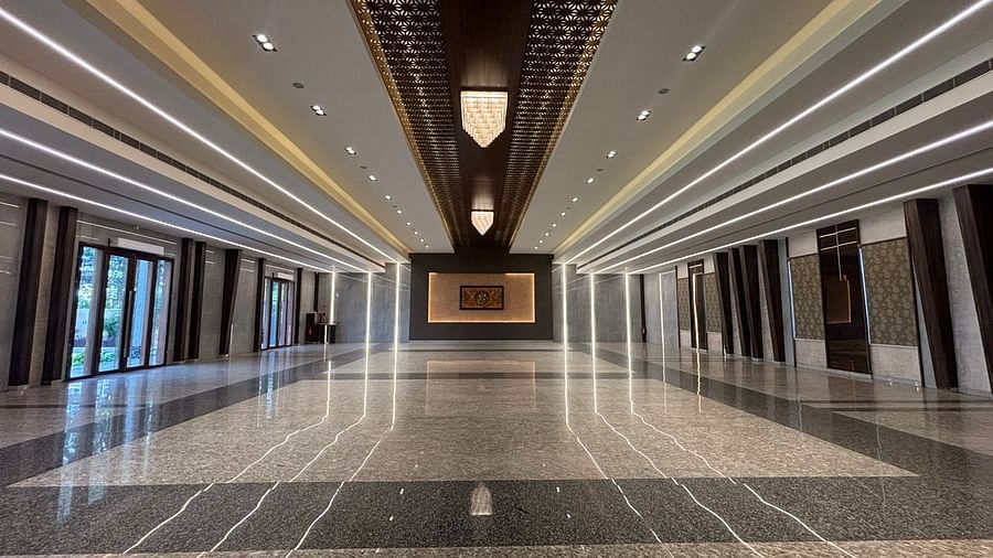 A grand banquet hall with expansive interiors, ideal for hosting large events.