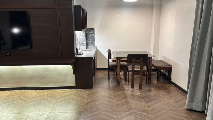 In-room dining and living space at Lords Riverside Resort, Muduba - Shivamogga