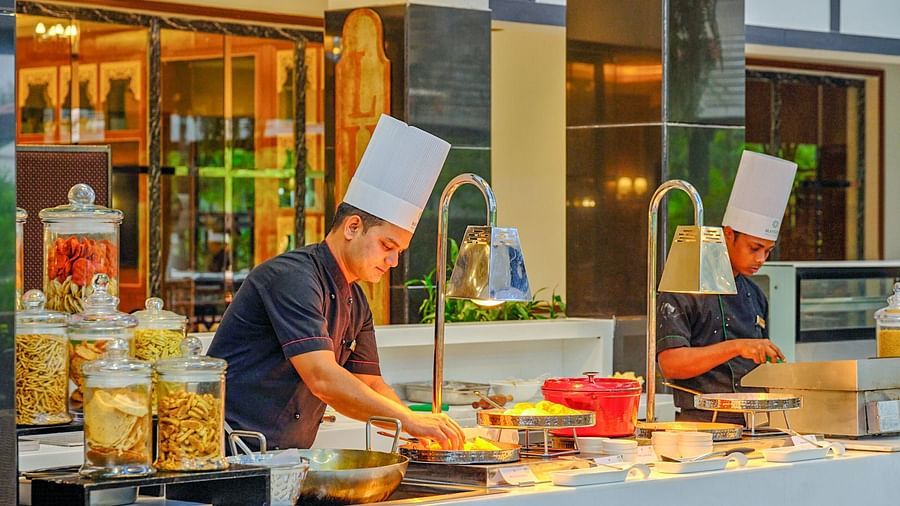 chefs working at the live counter at tea pot - Mayfair Tea Resort, Siliguri 1