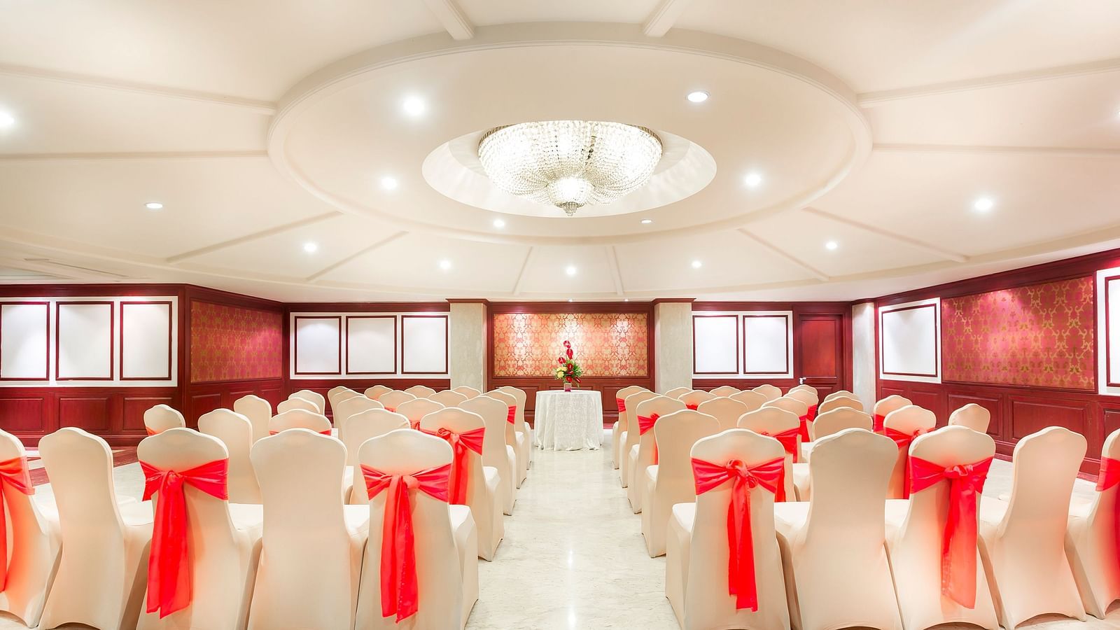 Lotus GC banquet hall seating with chairs at Grand Chennai By GRT Hotels.
