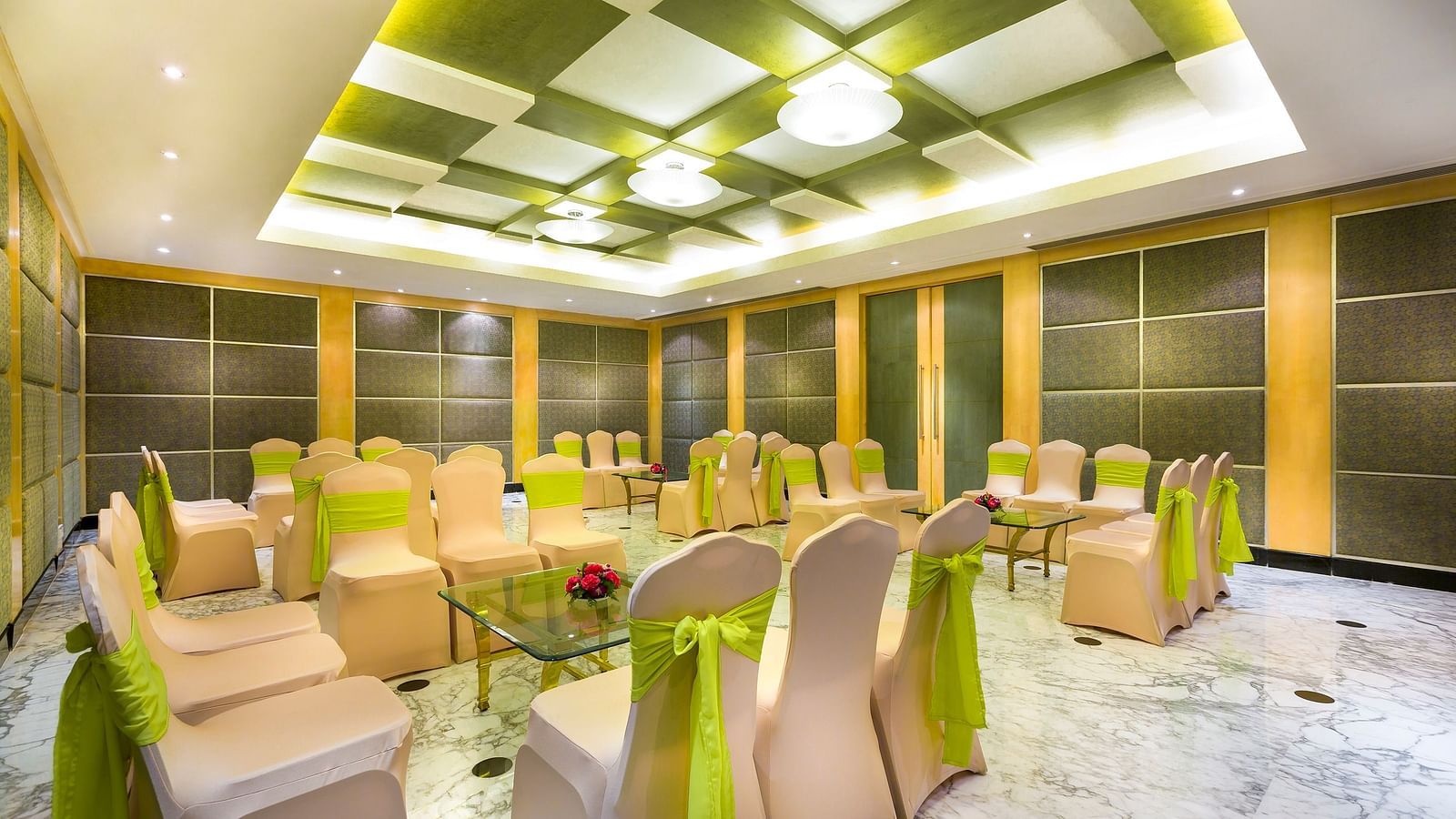 Banquet hall seating with chairs at Grand Chennai By GRT Hotels.
