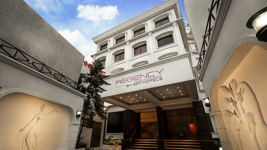 The entrance of hotel in Kanchipuram near Kamakshi Temple with a signboard indicating its name - Regency Kanchipuram By GRT Hotels.