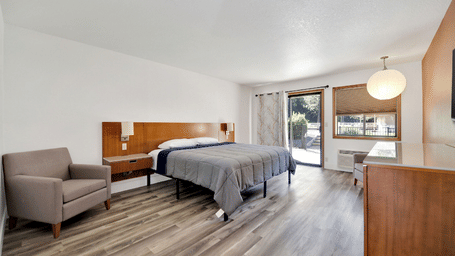 A view of one of the pet-friendly rooms in Pioneer, CA ,at Amador Hotel featuring a double bed.