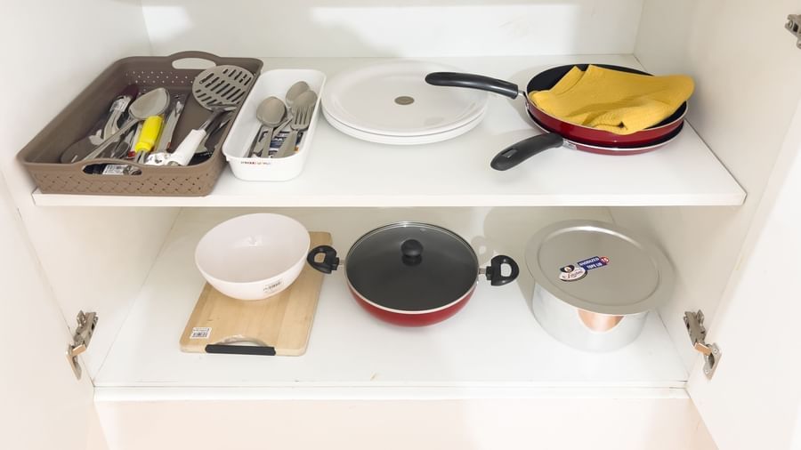 Organised kitchen shelf with neatly arranged cooking essentials at The Pinnacle, Electronic City.