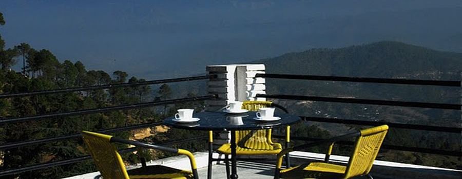 Rooftop restaurant offering stunning views of snow-capped mountains.