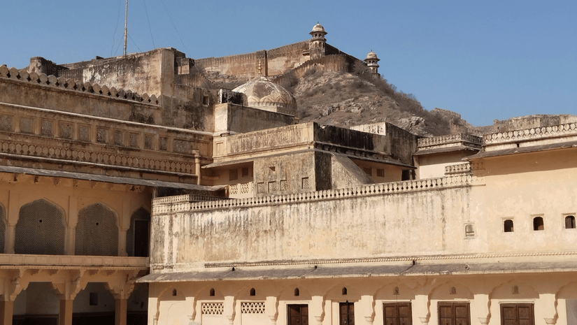 One of Amer Fort's four expansive courtyard, under the bright blue sky.