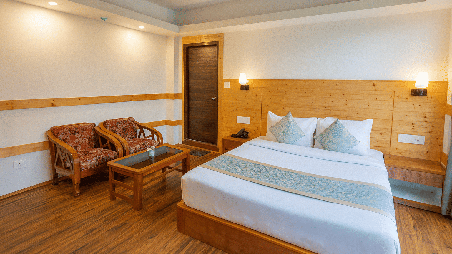 Deluxe hotel room in Gangtok with wooden interiors