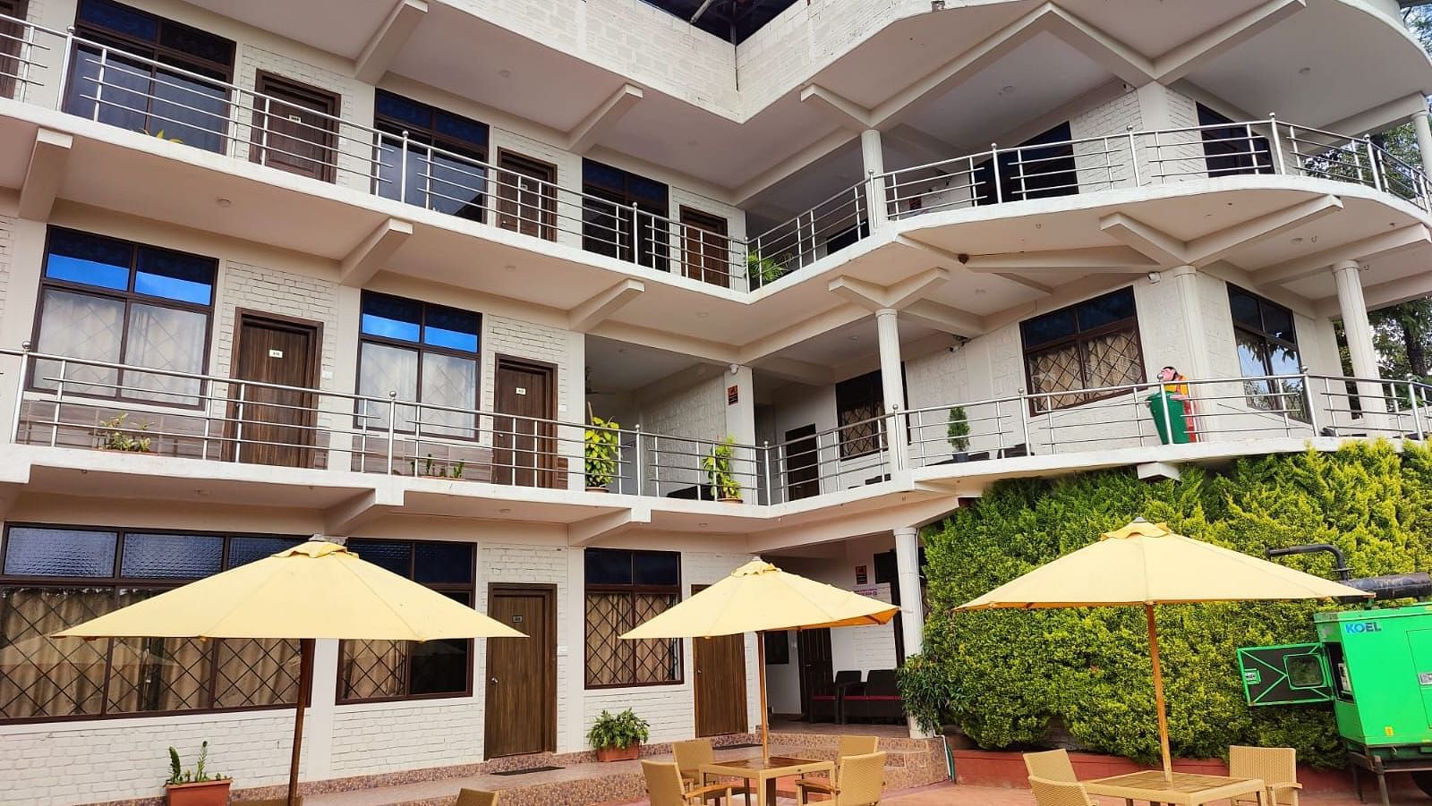 Facade of the resort with patios | Standard Room | Woodstock Resorts, Coorg
