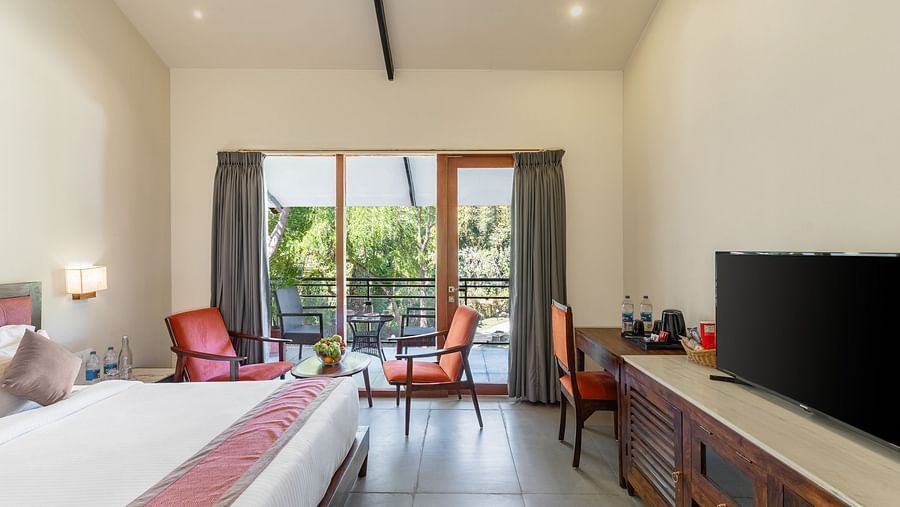image of the luxury cottage room featuring a full length french windows at the  far end of the room