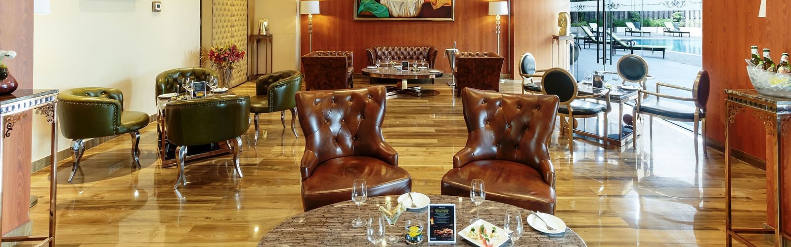 Various kind of seating in the bar at Golden Suites, Gurgaon
