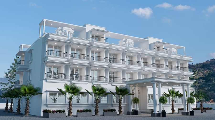 Full view of the exterior of Namaste Corbett with a clear blue sky in the background.