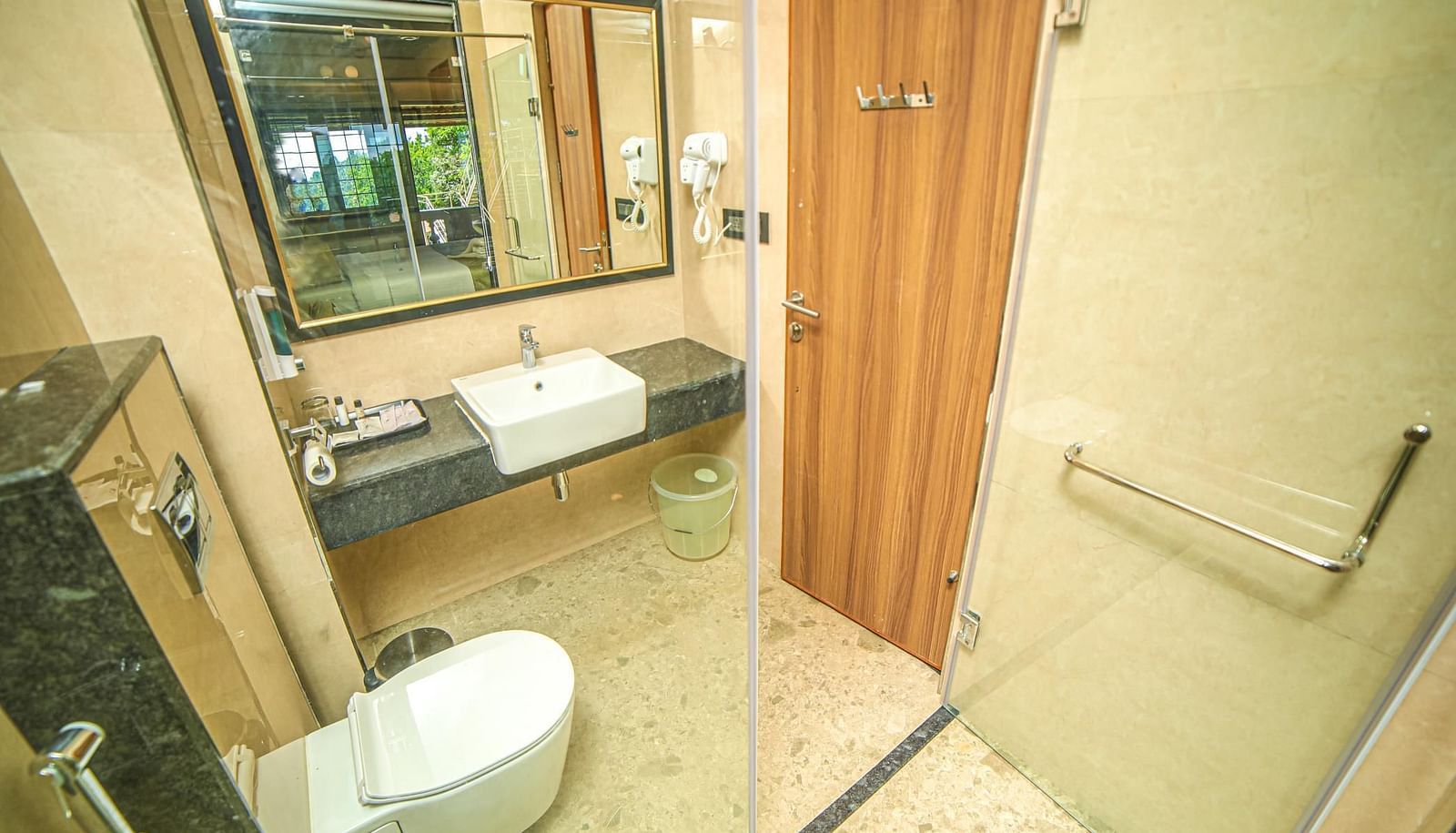 Washroom in the Premium Balcony Room at Grand Palace, Yercaud