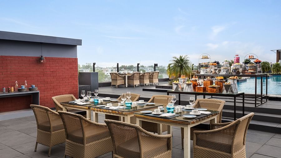 Rooftop seating arrangement at Essentia Luxury Hotel, Indore