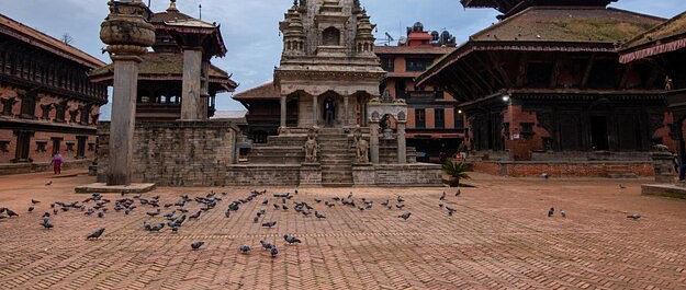 The bhaktapur durbar square with a clear sky in the background