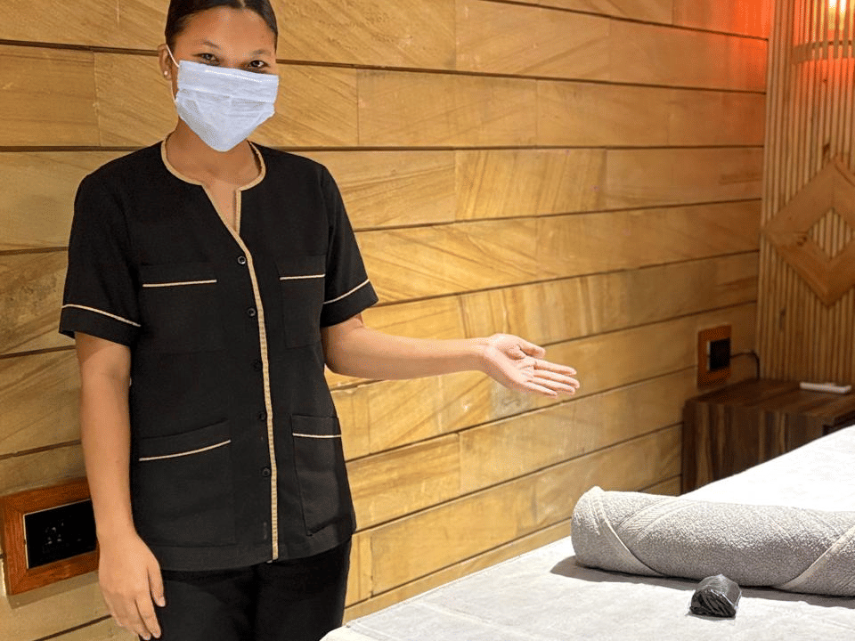Skyline by Miraya, SKYN Spa, Therapist at the treatment room door