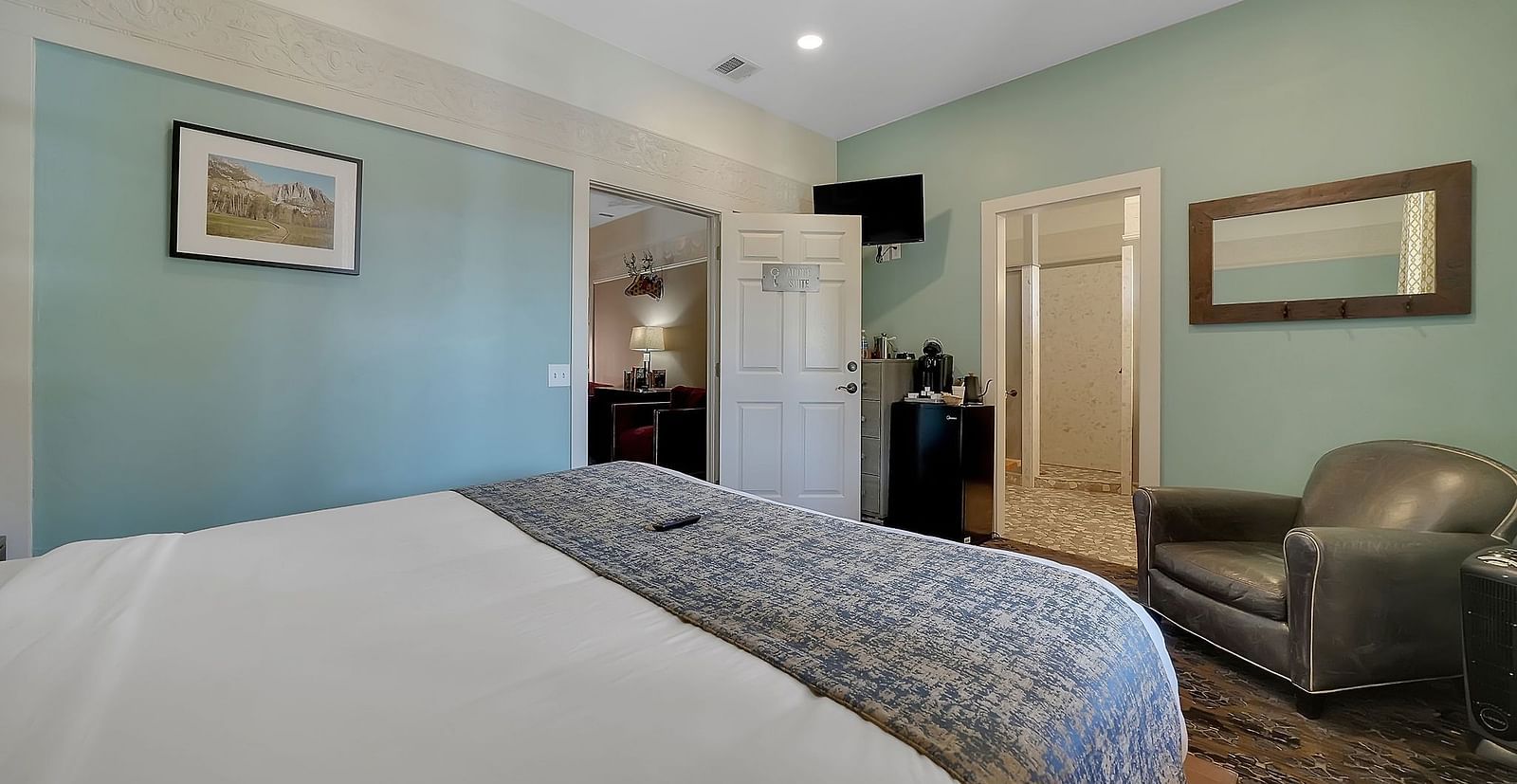 A view of a room at The Groveland Hotel with a double bed.